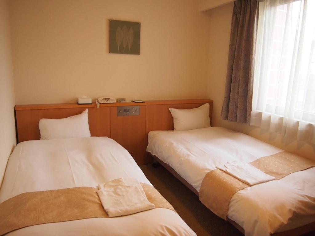 Nest Hotel Kumamoto Pokoj fotografie
