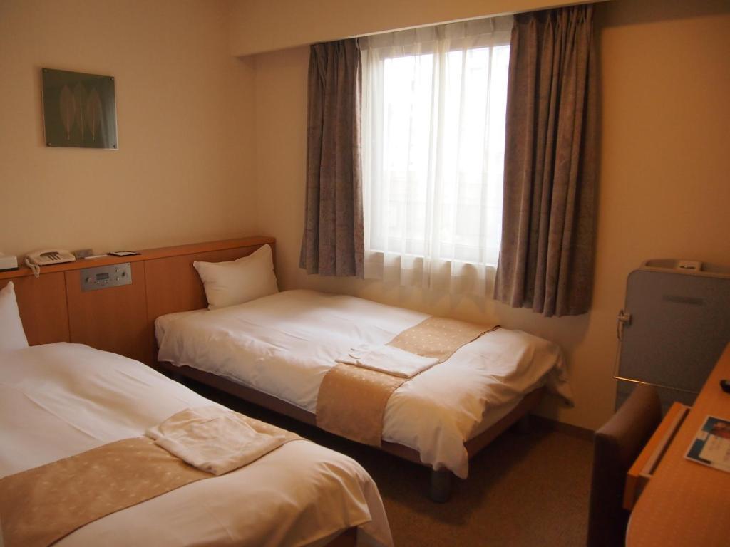 Nest Hotel Kumamoto Pokoj fotografie