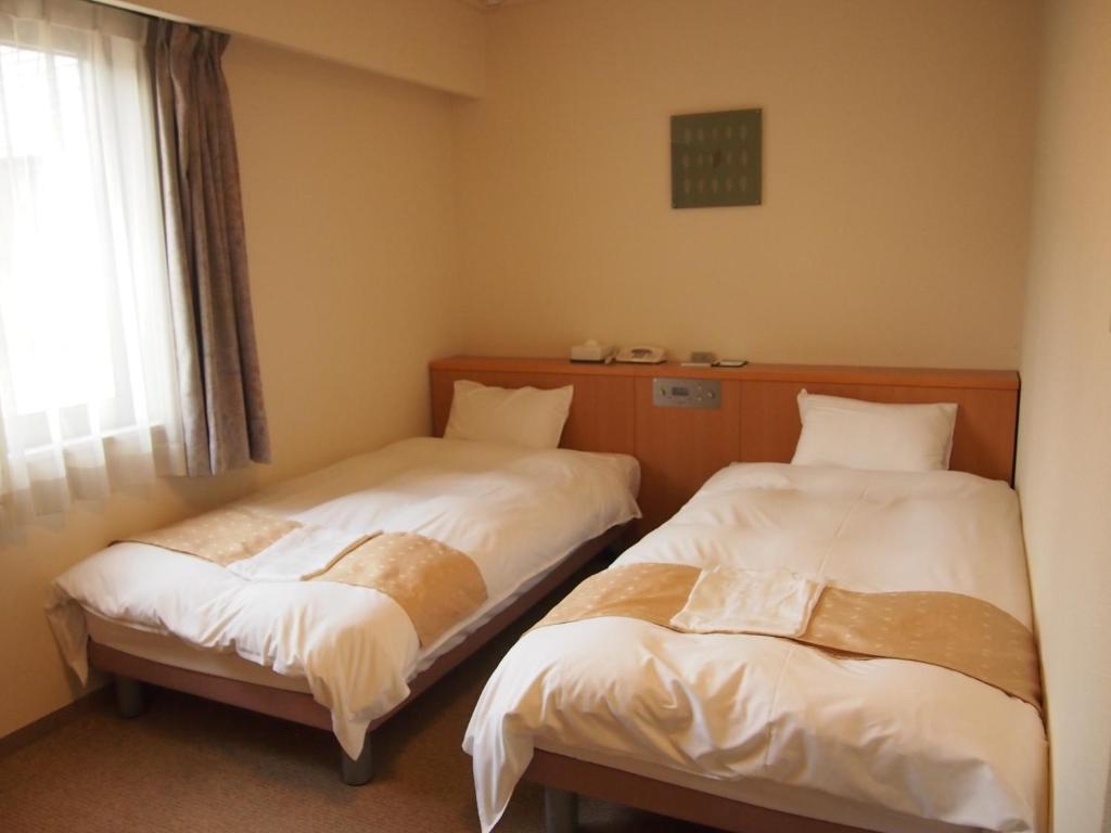 Nest Hotel Kumamoto Pokoj fotografie